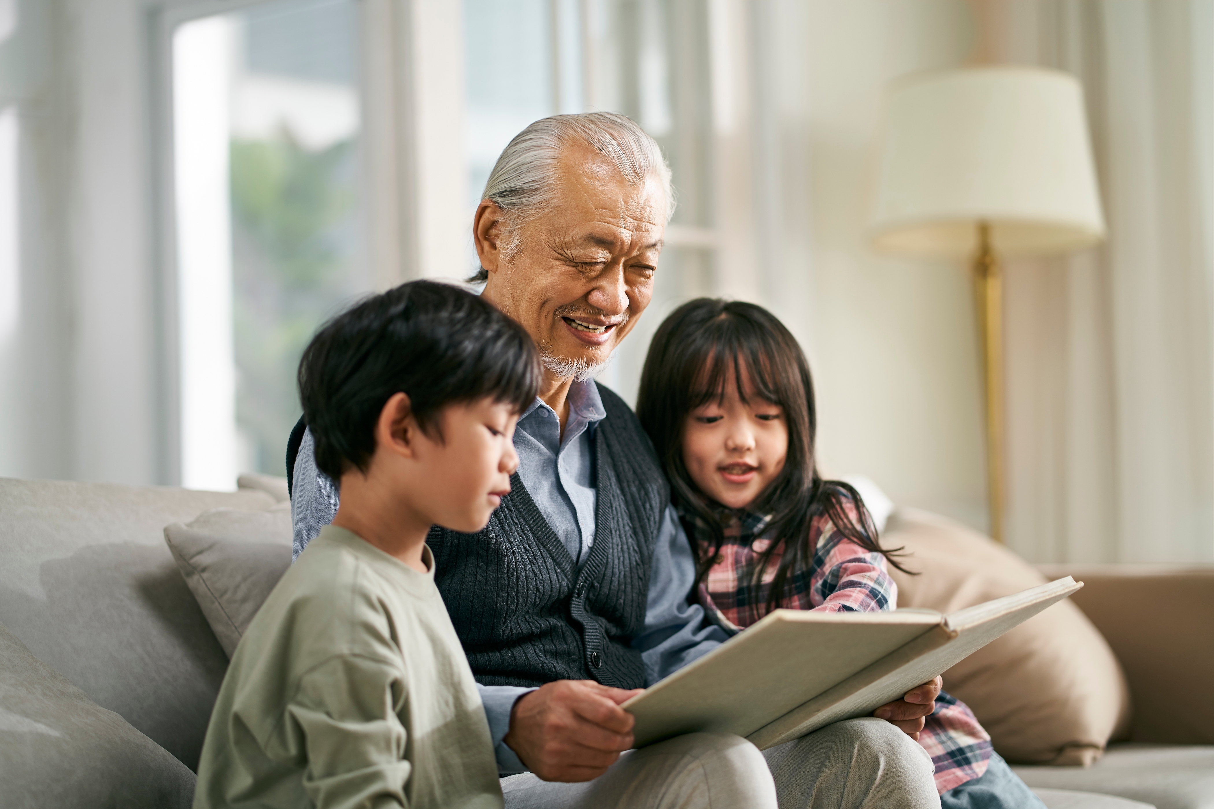 An older couple looking at photos together